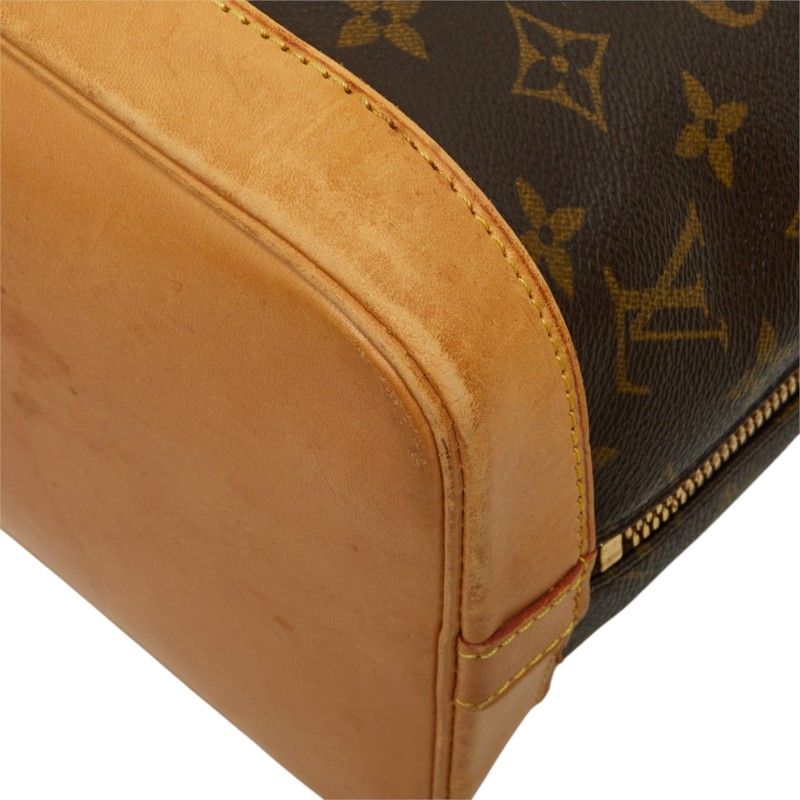 Louis Vuitton Alma PM Monogram Handbag
