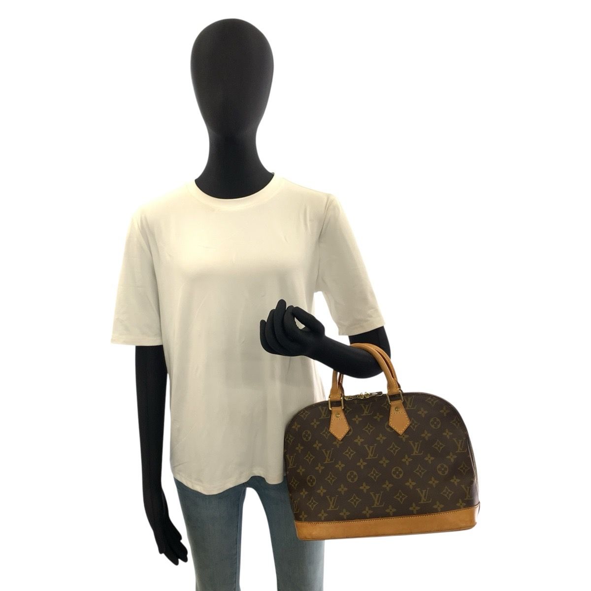 Louis Vuitton Alma Monogram Handbag