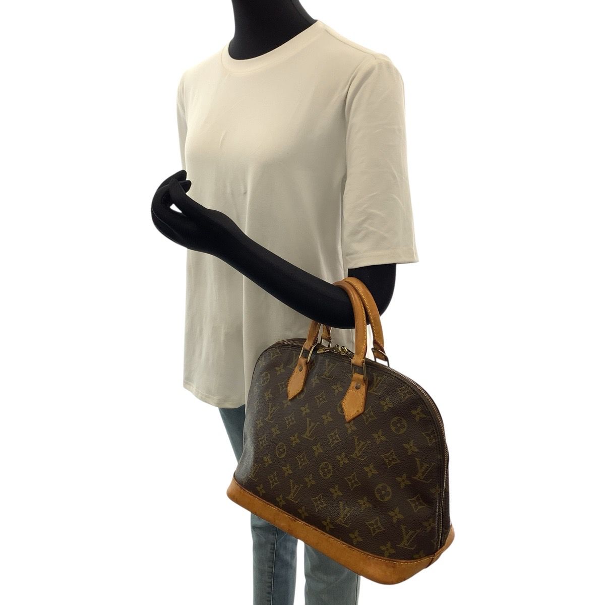 Louis Vuitton Alma Monogram Handbag